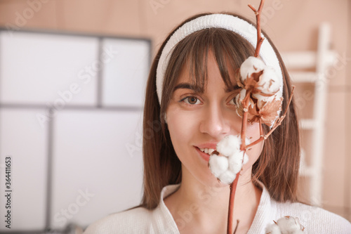 Beautiful young woman with ...