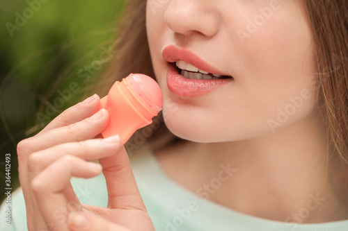 Beautiful young woman with ...
