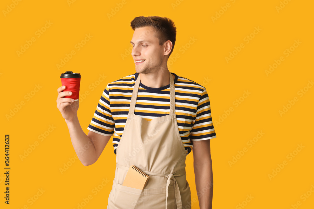 Young male barista on color background Young male barista on color background