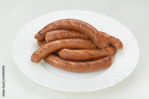 homemade sausage on a white plate white background