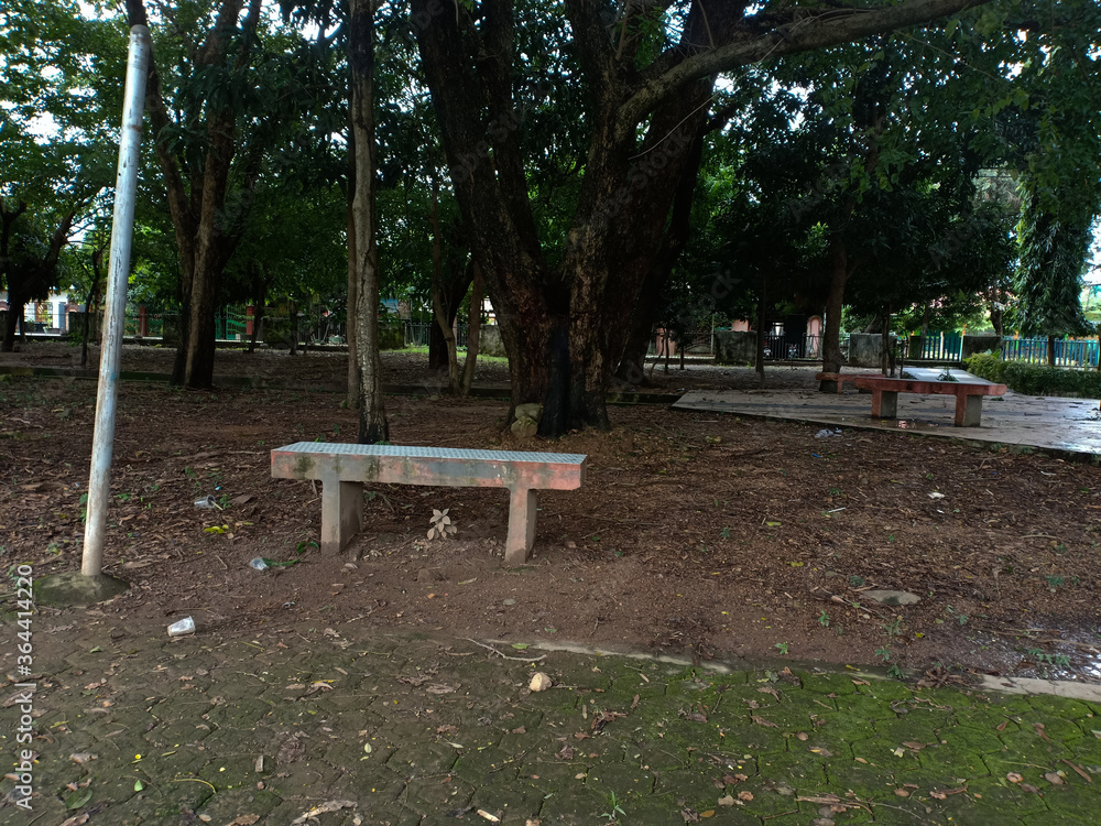 brick sitting chairs in a city park brick sitting chairs in a city park