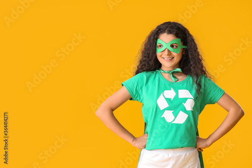 Woman dressed as eco superh...