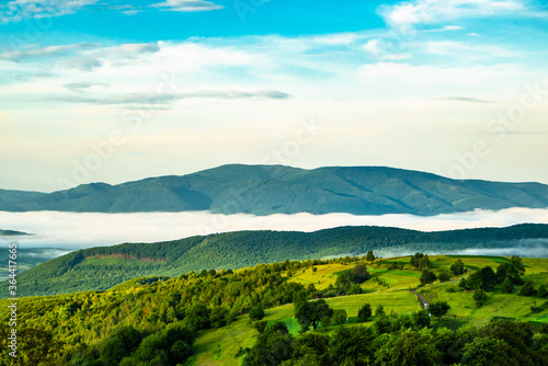 beautiful view of the mountain tops and forests in the fog. period of the day morning.