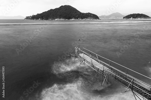 Idyllic landscape of jetty and island in Hong Kong photo