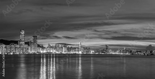 Panorama of Victoria harbor of Hong Kong city at dusk