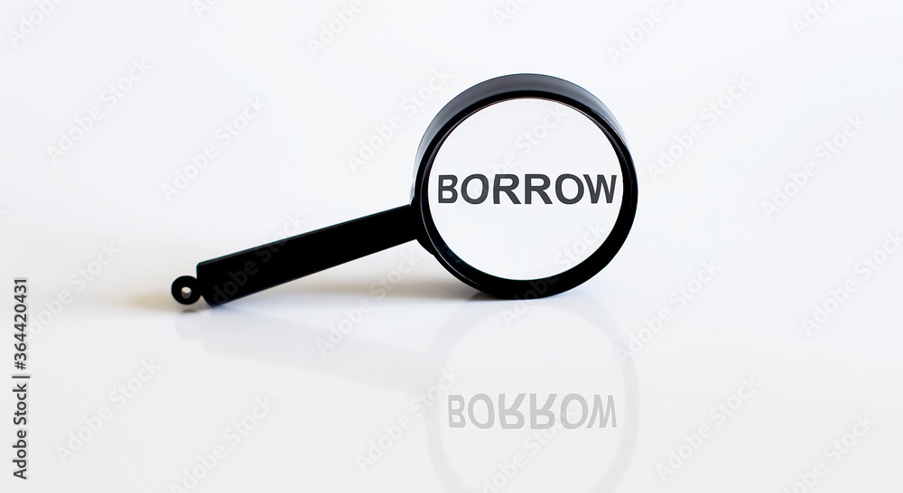 Magnifier with text BORROW on the white background Magnifier with text BORROW on the white background