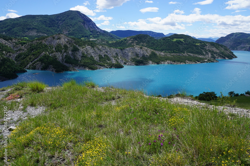 panoramic view of the Serre Ponçon lake in the french Alps