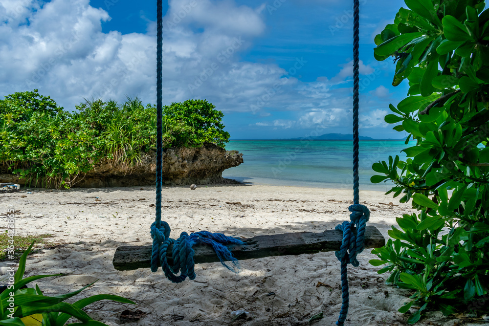 Rustic swing at the beautiful tropical beach, Ishigaki Island, Okinawa, Japan
