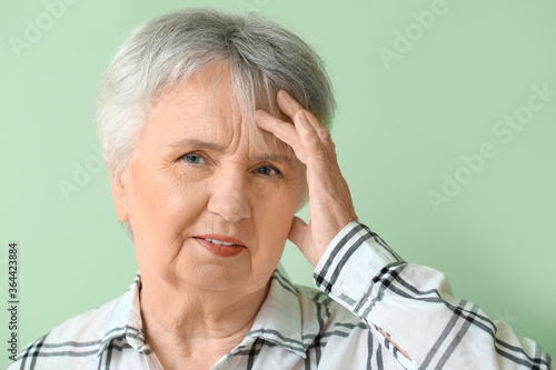 Senior woman suffering from...