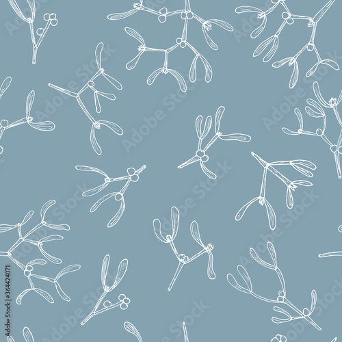 Vector seamless pattern with hand drawn mistletoe twigs and berries