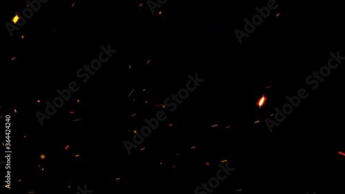 Abstract particle dust burning hot sparks random flowing on black background. Seamless looped 3d animation dust and fiery orange glowing particles flying for overlay your cinematic footage. photo