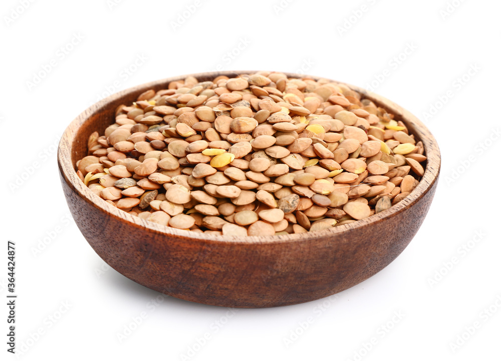 Plate with raw lentils on white background
