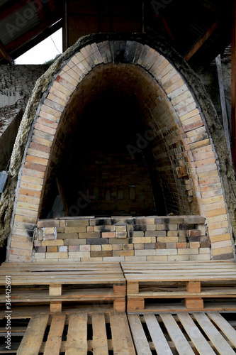 Refractory brick kiln for firing clay products in a pottery workshop © Svitlana