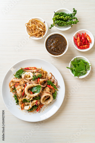 stir fried holy basil with octopus or squid and herb