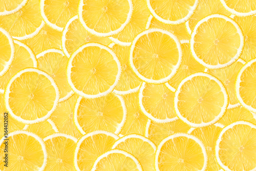 Fresh organic yellow lemon slices isolated on white background . Lemon seamless pattern texture for nature background. Top view. Flat lay.