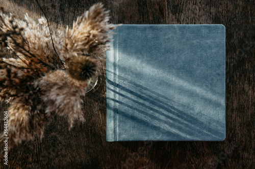 Photo album in a textile, velvet binding for pasting photos, top view