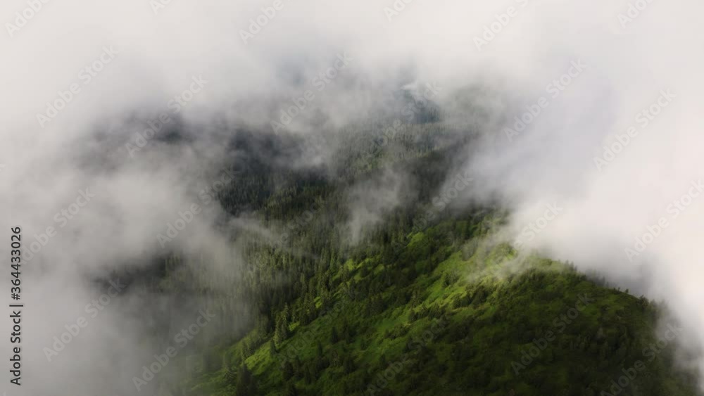 Aerial top view Landscape Above Mountains after rain. Drone Flying in Clouds. Travel concept. Tent in mountains Aerial top view Landscape Above Mountains after rain. Drone Flying in Clouds. Travel concept. Tent in mountains