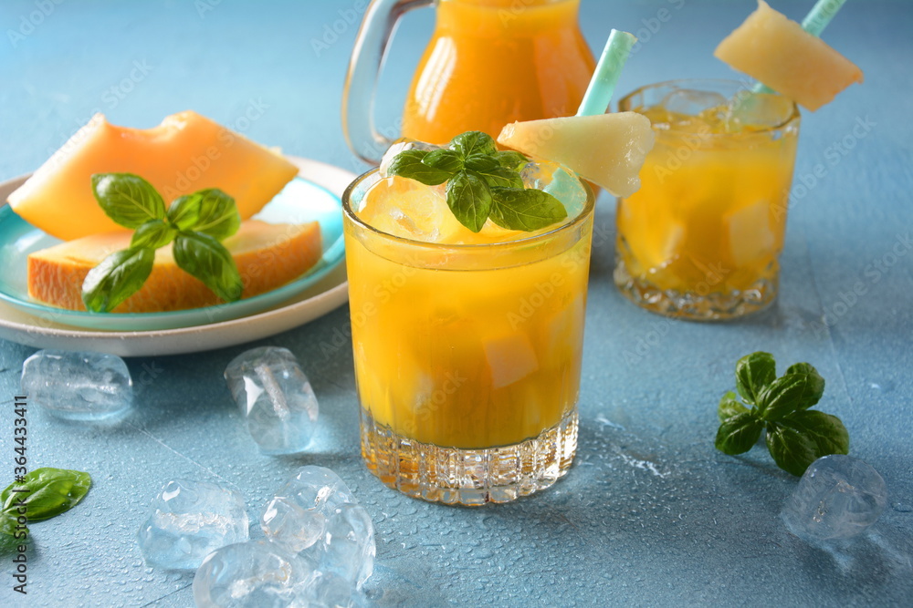 Refreshing drinks and citrus juices with ice cubes, mint and watermelon. Summer concept Refreshing drinks and citrus juices with ice cubes, mint and watermelon. Summer concept