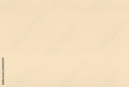 Sheet of textured pale yellow coloured creative paper background. Extra large highly detailed image.