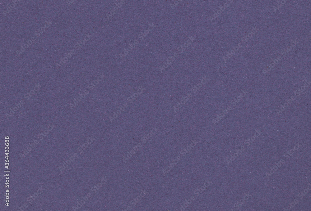 Dark violet paper carton background with inclusions of recycled paper particles. Extra large highly detailed image. Recycled paper concept.