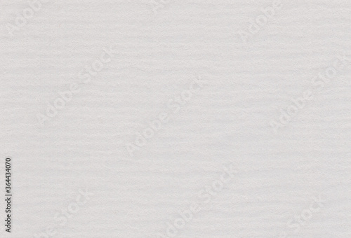 Close up view of textured grey coloured creative paper background. Extra large highly detailed image.