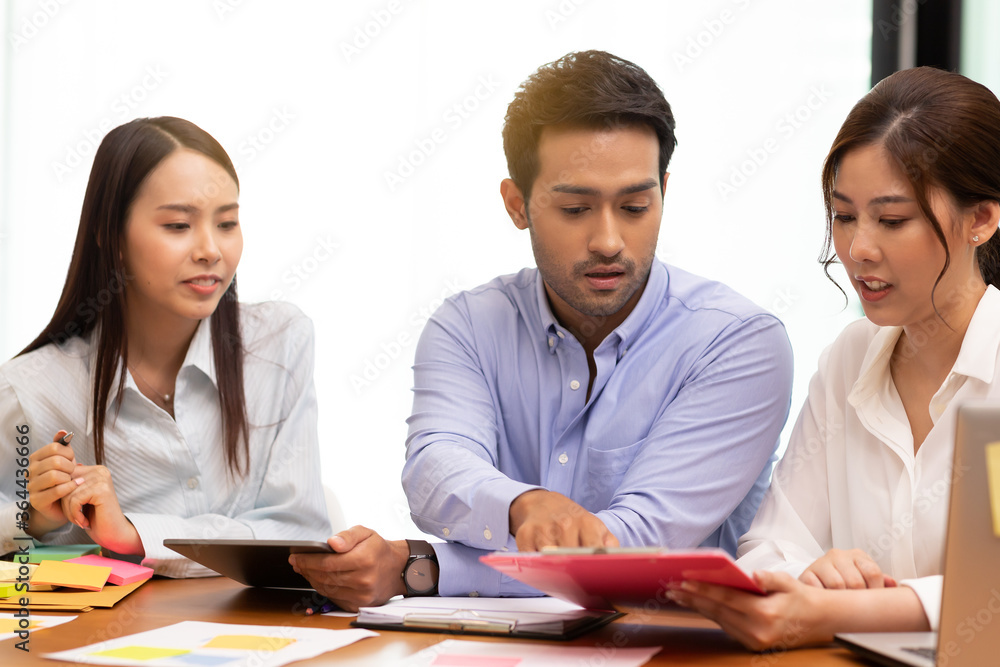 Asian business man and women meeting and talk about job in office. Asian business man and women meeting and talk about job in office.