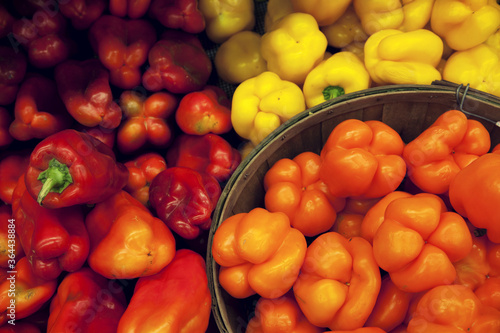 Multicolored bell peppers on display in market