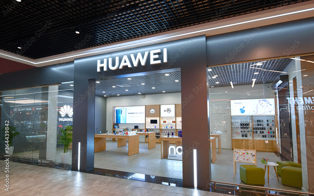 Minsk, Belarus. Feb 2020. Huawei store in the shopping mall. Huawei store  with product display. Chinese multinational networking, telecommunications  equipment, and services company. Photos | Adobe Stock