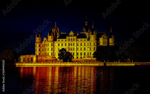 Schwerin Castle illuminated at night. Germany