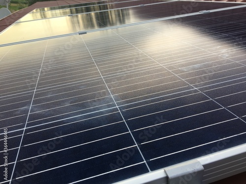 Solar panels on the roof. Alternative energy. Sunlight power