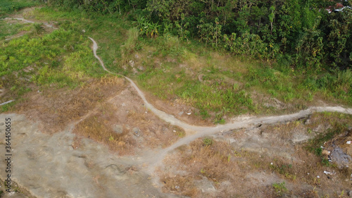 aerial view of dried grass on the river bank