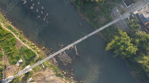 aerial view of a suspension bridge that connects between villages in Bantul. Yogyakarta Indonesia