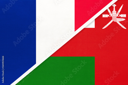 France and Sultanate of Oman, symbol of national flags from textile. Championship between two countries.