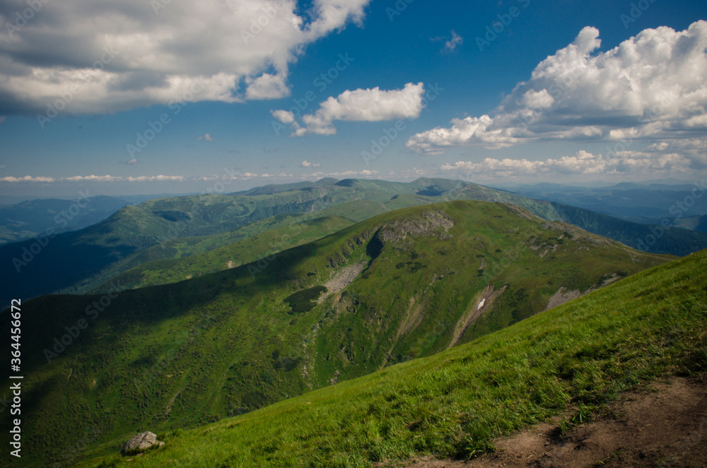 Naklejka premium mountain landscape with blue sky