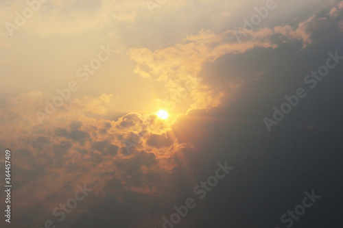 clouds, sun and sky before sunset background.