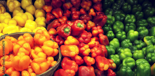 View of multicolored bell peppers on display in market