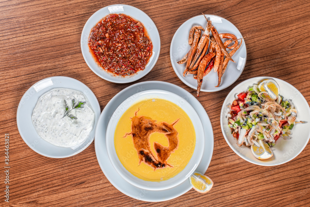Turkish Traditional lentil Soup with bread on white rustic wooden background, mercimek corbasi. Turkish Traditional lentil Soup with bread on white rustic wooden background, mercimek corbasi.