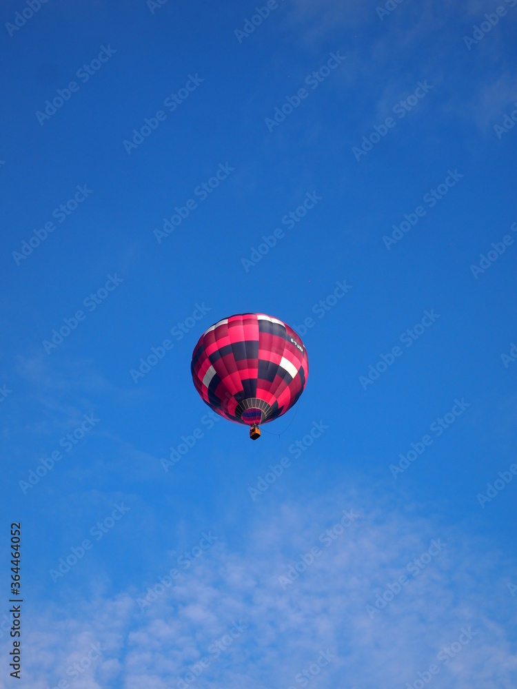 Fototapeta premium Hot air balloon against blue sky
