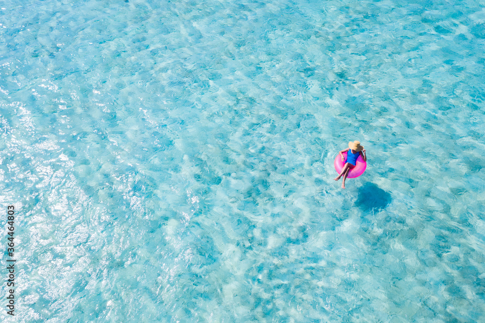 Top above high angle aerial drone view of her she slim fit girl floating on rubber ring in sea water pool poolside dream tour enjoying relax recreation sunny weather outdoor fresh air breeze