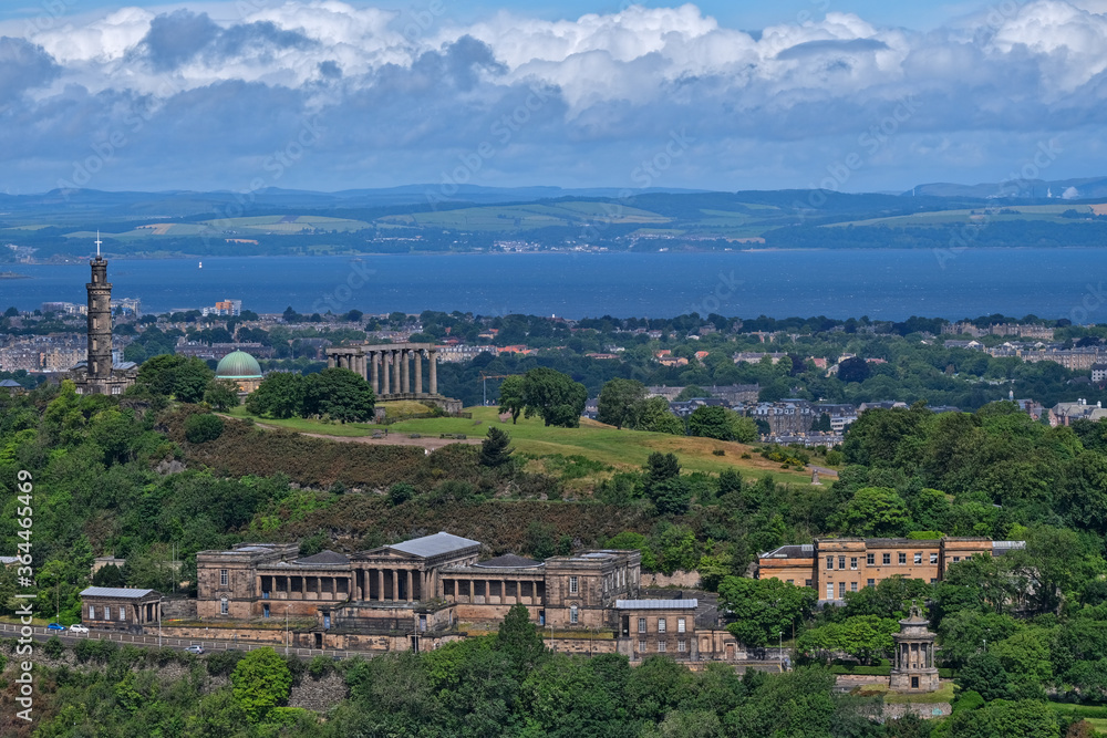 Aerial view of the Calton Hill in Edinburgh, with famous landmarks such as the National Monument, Nelson Monument, the observatory and the new parliament house