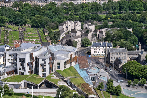 Aerial photo of the Parliament building in Edinburgh and the Canongate Kirkyard behind it photo