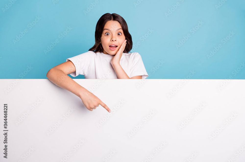 Portrait of nice attractive cheerful amazed wavy-haired girl demonstrating copy space ad advert advice isolated on bright vivid shine vibrant blue teal turquoise color background Portrait of nice attractive cheerful amazed wavy-haired girl demonstrating copy space ad advert advice isolated on bright vivid shine vibrant blue teal turquoise color background