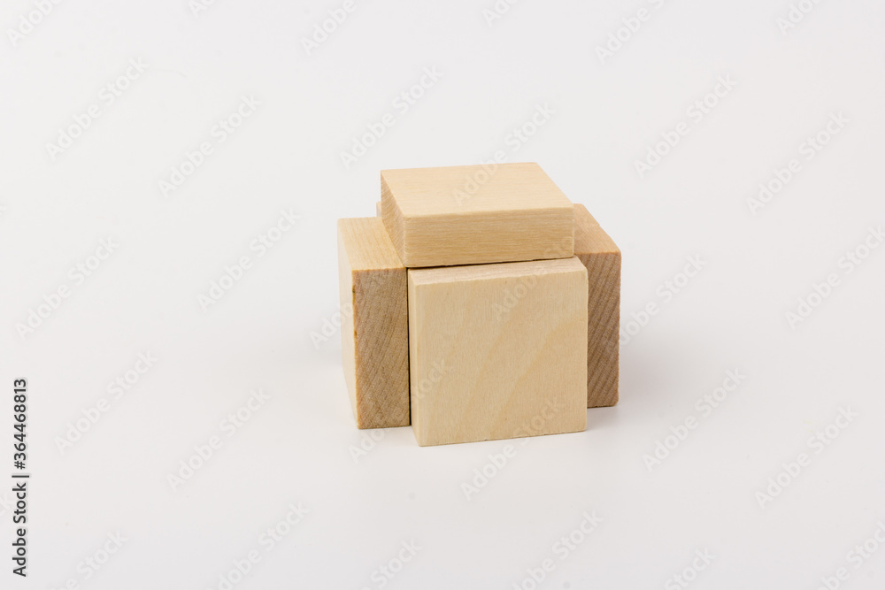 Wooden blocks to build a wall. Concept of new business, partnership, integration and startup Wooden blocks to build a wall. Concept of new business, partnership, integration and startup