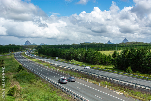 The Bruce Highway in the early morning making its way south to Brisbane past the Glasshouse Mountains. Queensland, Australia.