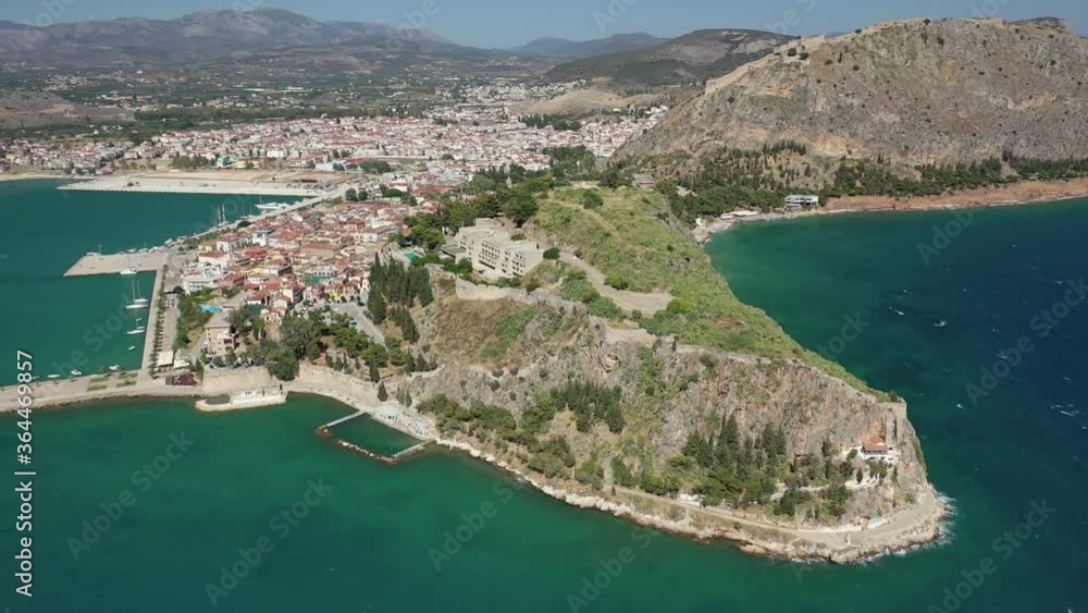 Aerial drone video of famous castle and beach of Arvanitia in the slopes of Acronafplia, Nafplio, Argolida, Peloponnese, Greece Aerial drone video of famous castle and beach of Arvanitia in the slopes of Acronafplia, Nafplio, Argolida, Peloponnese, Greece