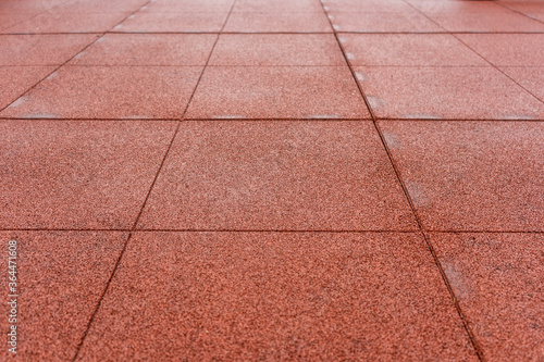 Soft rubber tiles on the Playground