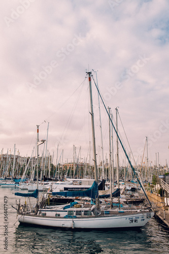 Cloudy Sky with Many Sailboats at Marina in Barcelona, Spain