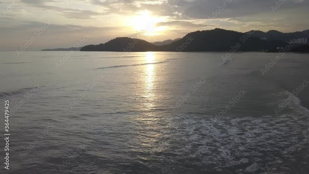 Wave at Permatang Damar Laut during sunset hour. Wave at Permatang Damar Laut during sunset hour.