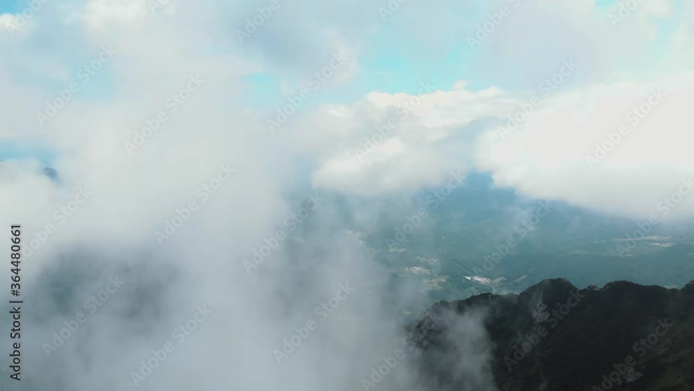 Strada delle 52 gallerie, The road with 52 tunnels. Aerial view in a cloudy and foggy day near Italian mountains. Pasubio mountains region, dolomiti alps, north Italy. Strada delle 52 gallerie, The road with 52 tunnels. Aerial view in a cloudy and foggy day near Italian mountains. Pasubio mountains region, dolomiti alps, north Italy.