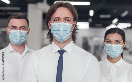 Business team in medical masks